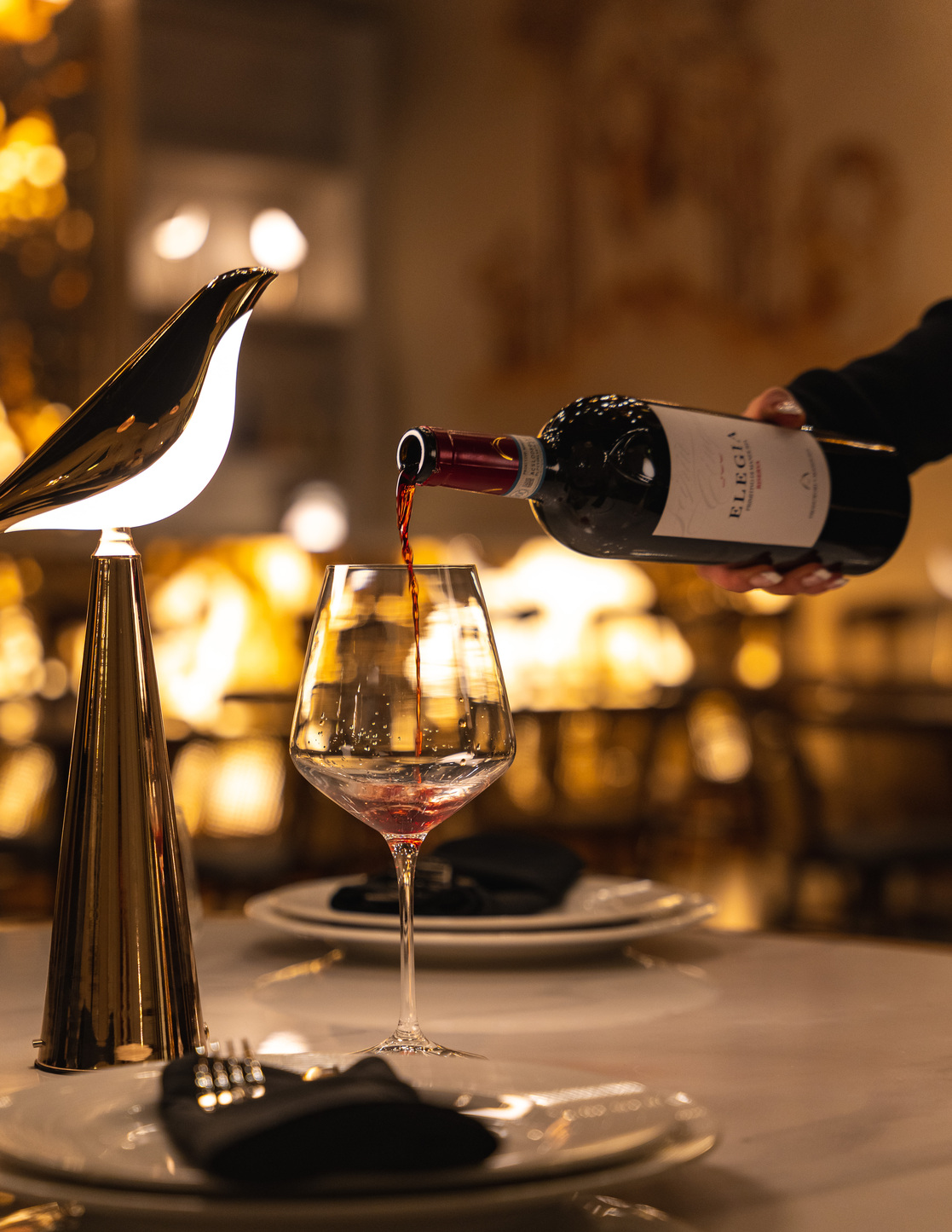 Wine poured at a set table